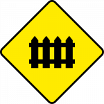 Level crossing ahead, guarded by gates or lifting barrier